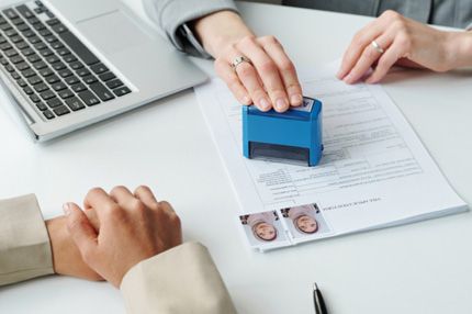 Stemp checking visa status at job interview-