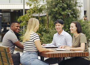 Stemp mixed group of students on campus collaborate outdoors