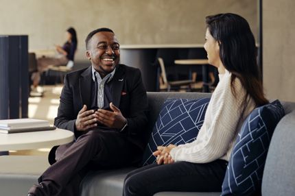 Stemp two people chatting during relaxed job interview