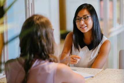 Stemp two women chatting during relaxed job interview