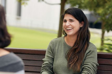 Campus female on park bench