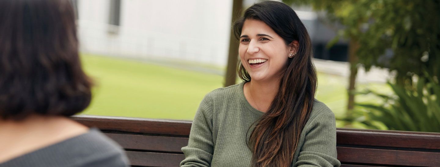 Campus female on park bench