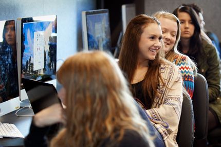 Campus group at computers in lab