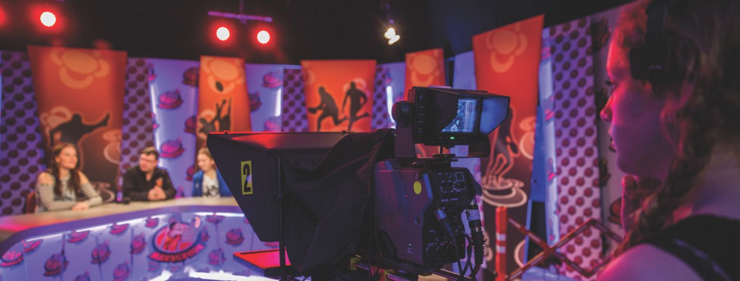 Campus group filming in tv studio