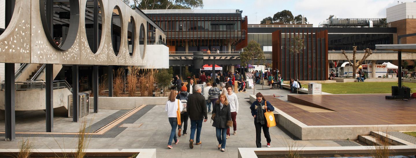 Campus group walking outside openday