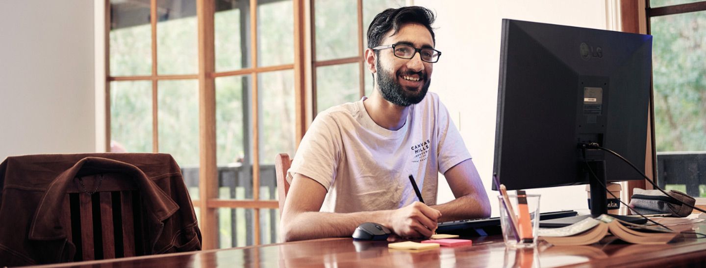Campus male working on computer