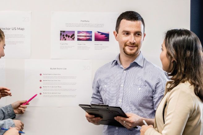 Group discussing on whiteboard