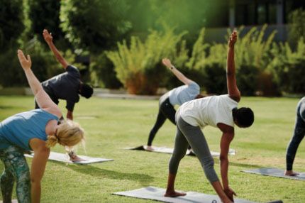 College group doing yoga