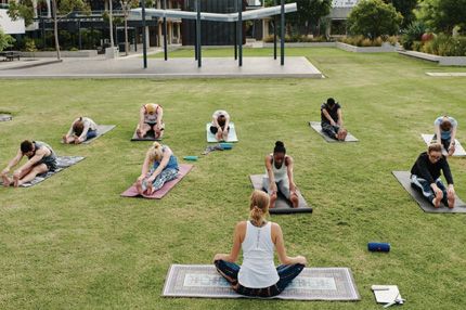 Group exercising doing yoga