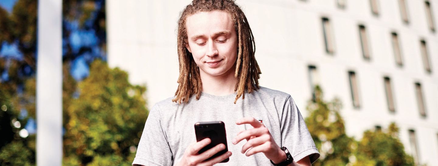 Male looking at phone