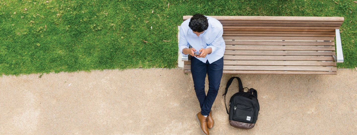 Male sitting on bench