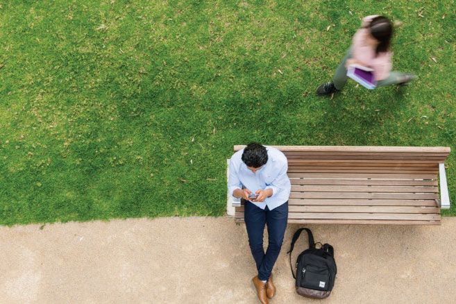 Male sitting on bench