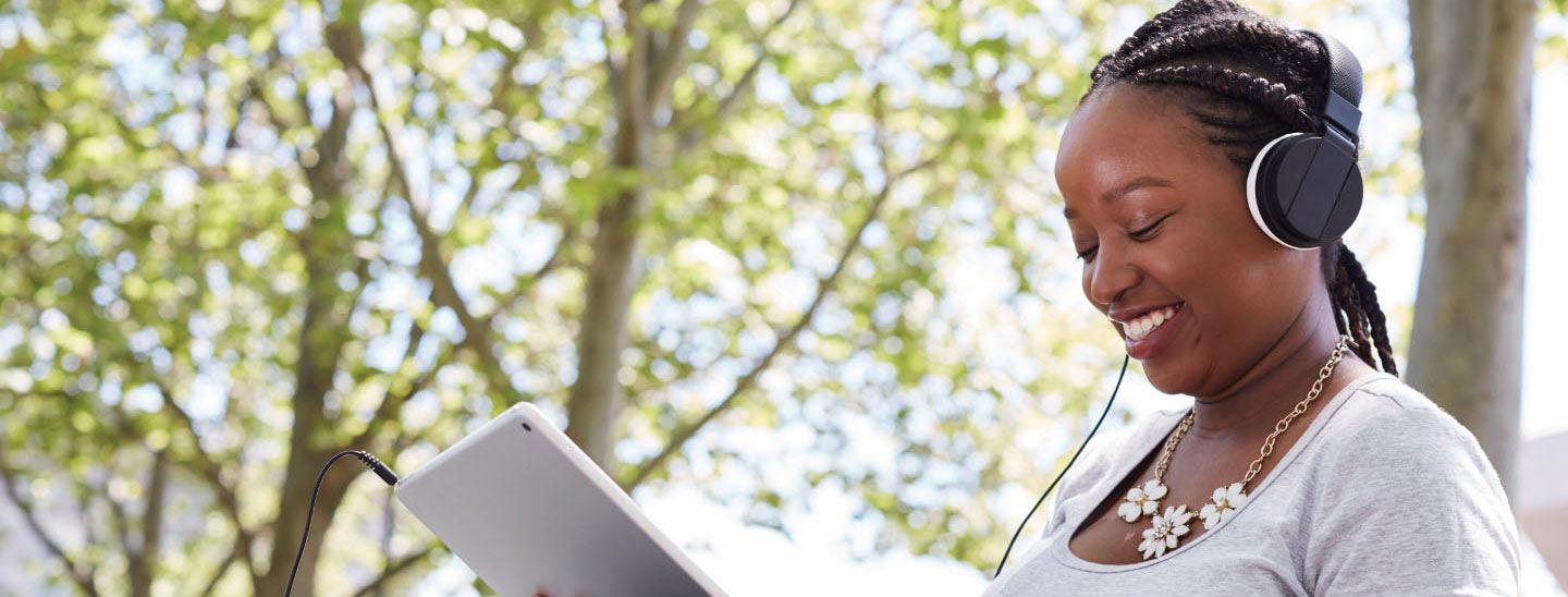Off campus female with headphones