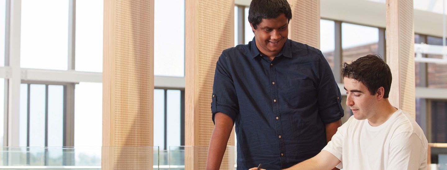 Two males discussing