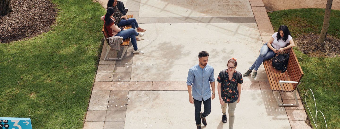 Two students walking to class